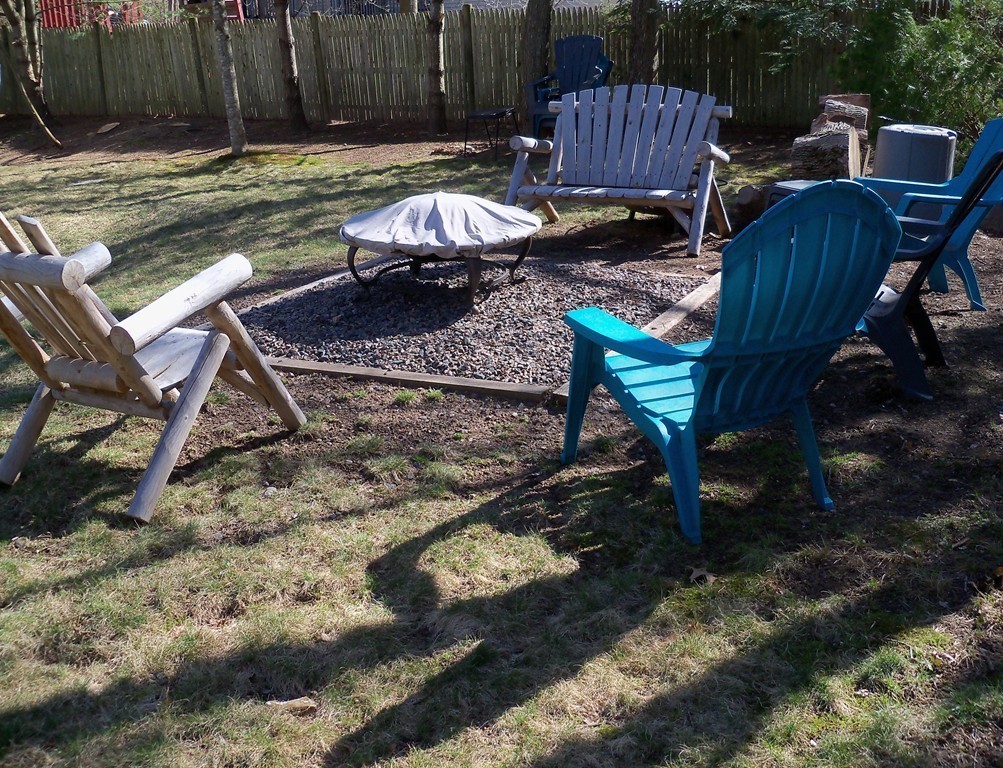 8 Hillcrest Road Canton, MA 02021 - Photo 7 of 29 a view of a backyard with sitting area furniture and wooden floor