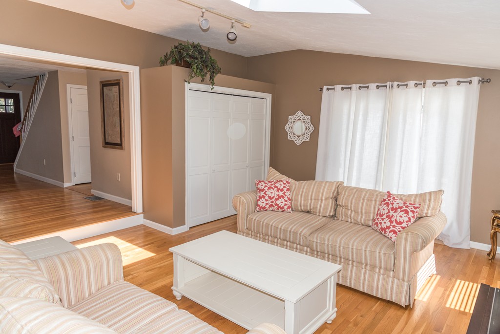 8 Hillcrest Road Canton, MA 02021 - Photo 9 of 29 a living room with furniture and a window