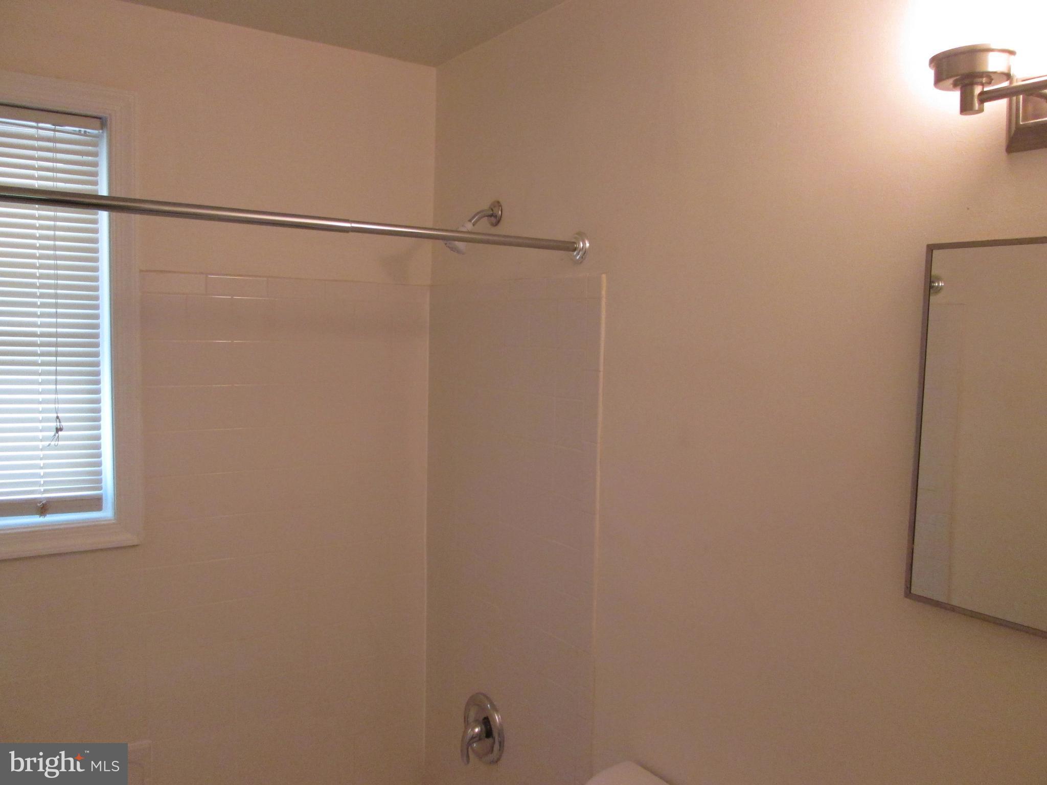 3304 Randolph Road Silver Spring, MD 20902 - Photo 12 of 22 a bathroom with a shower