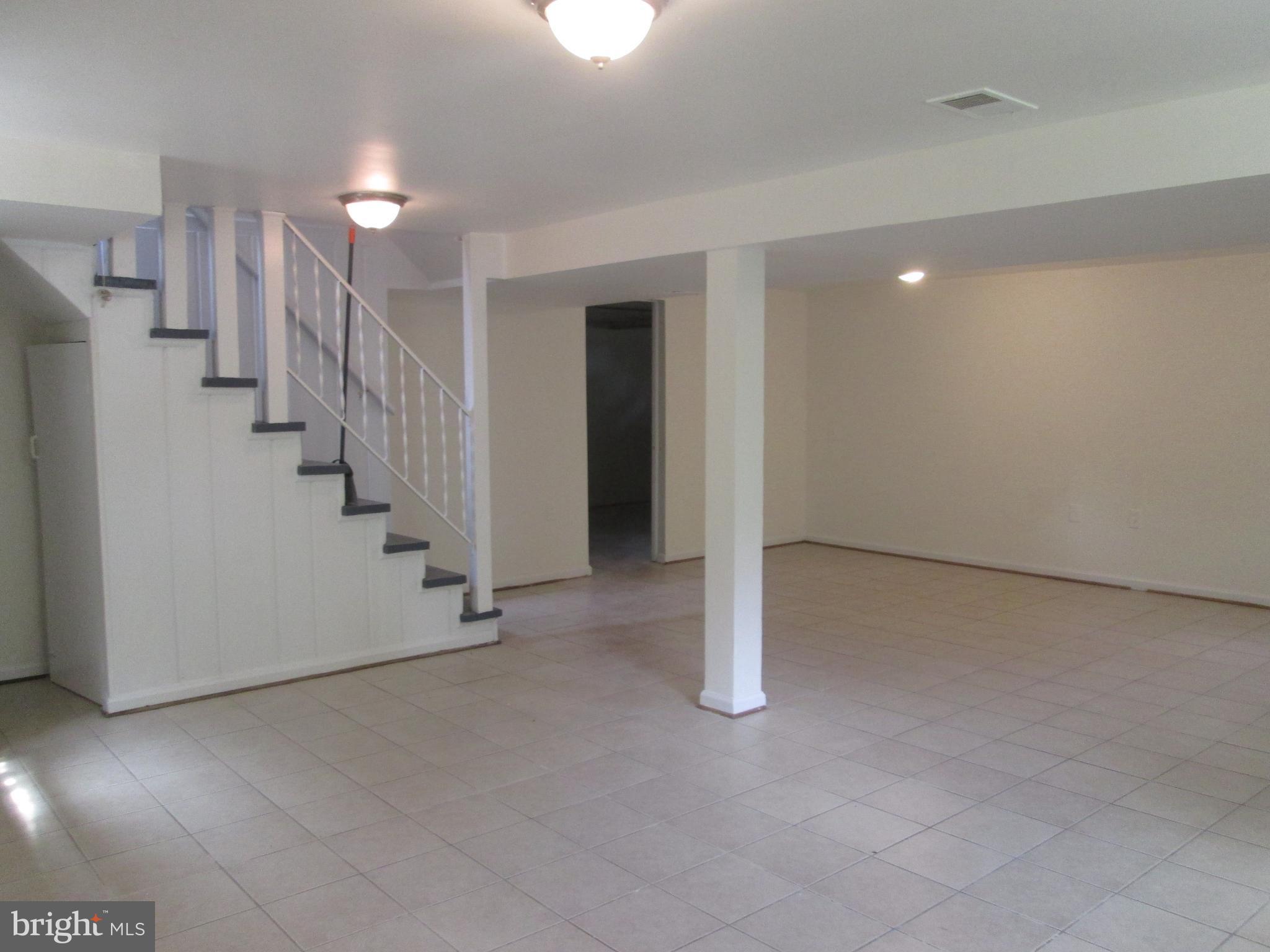 3304 Randolph Road Silver Spring, MD 20902 - Photo 15 of 22 a view of an empty room with stairs