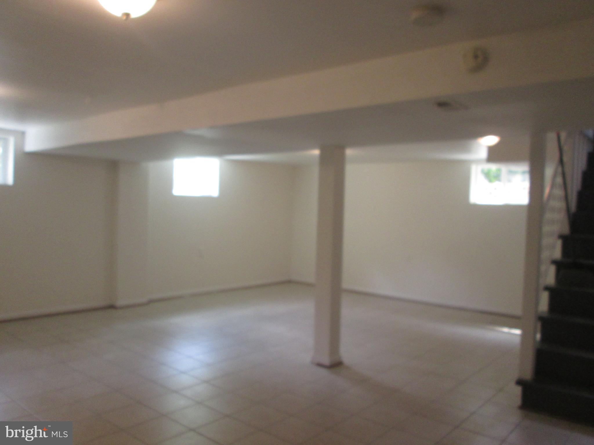 3304 Randolph Road Silver Spring, MD 20902 - Photo 16 of 22 an empty room with windows and closet