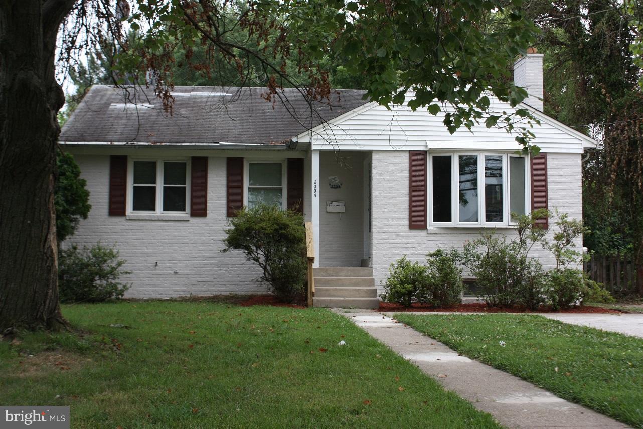 3304 Randolph Road Silver Spring, MD 20902 - Photo 3 of 22 a front view of a house with garden