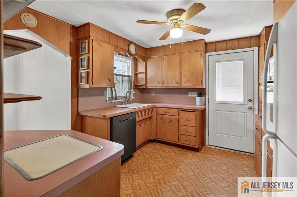 529 4th Street Dunellen, NJ 08812 - Photo 13 of 25 a kitchen with a sink appliances and cabinets
