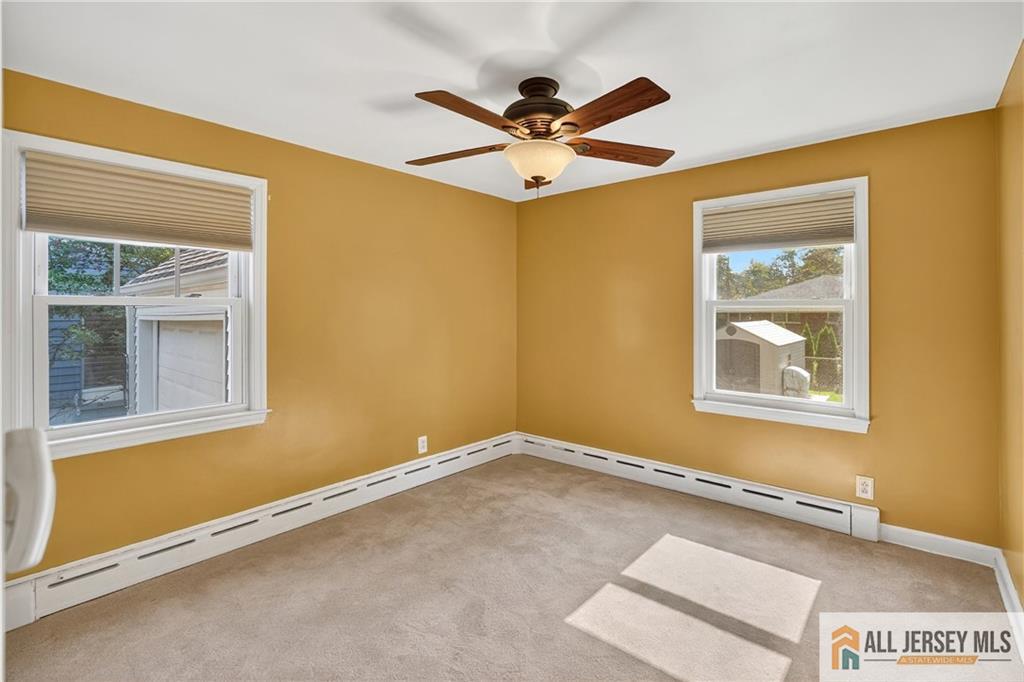 529 4th Street Dunellen, NJ 08812 - Photo 15 of 25 a view of an empty room with a window