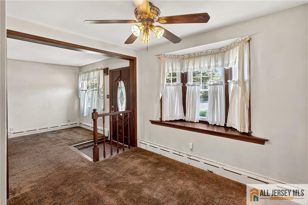 529 4th Street Dunellen, NJ 08812 - Photo 5 of 25 a view of a room with gym equipment