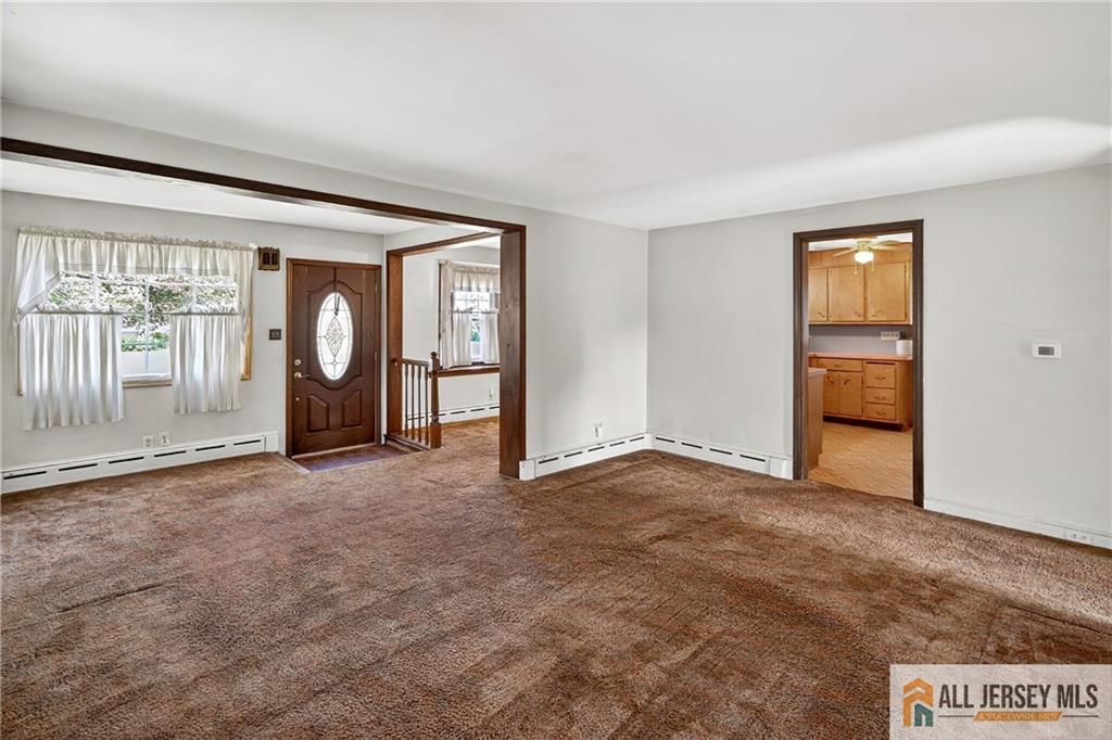 529 4th Street Dunellen, NJ 08812 - Photo 8 of 25 an empty room with windows and closet