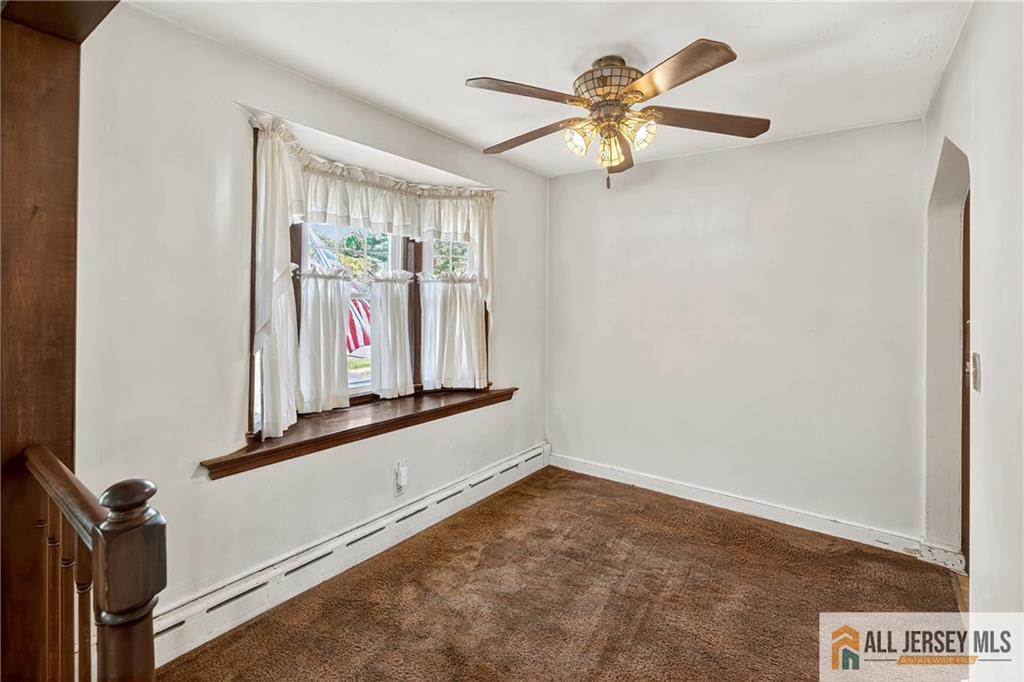 529 4th Street Dunellen, NJ 08812 - Photo 9 of 25 a view of a hallway with a window