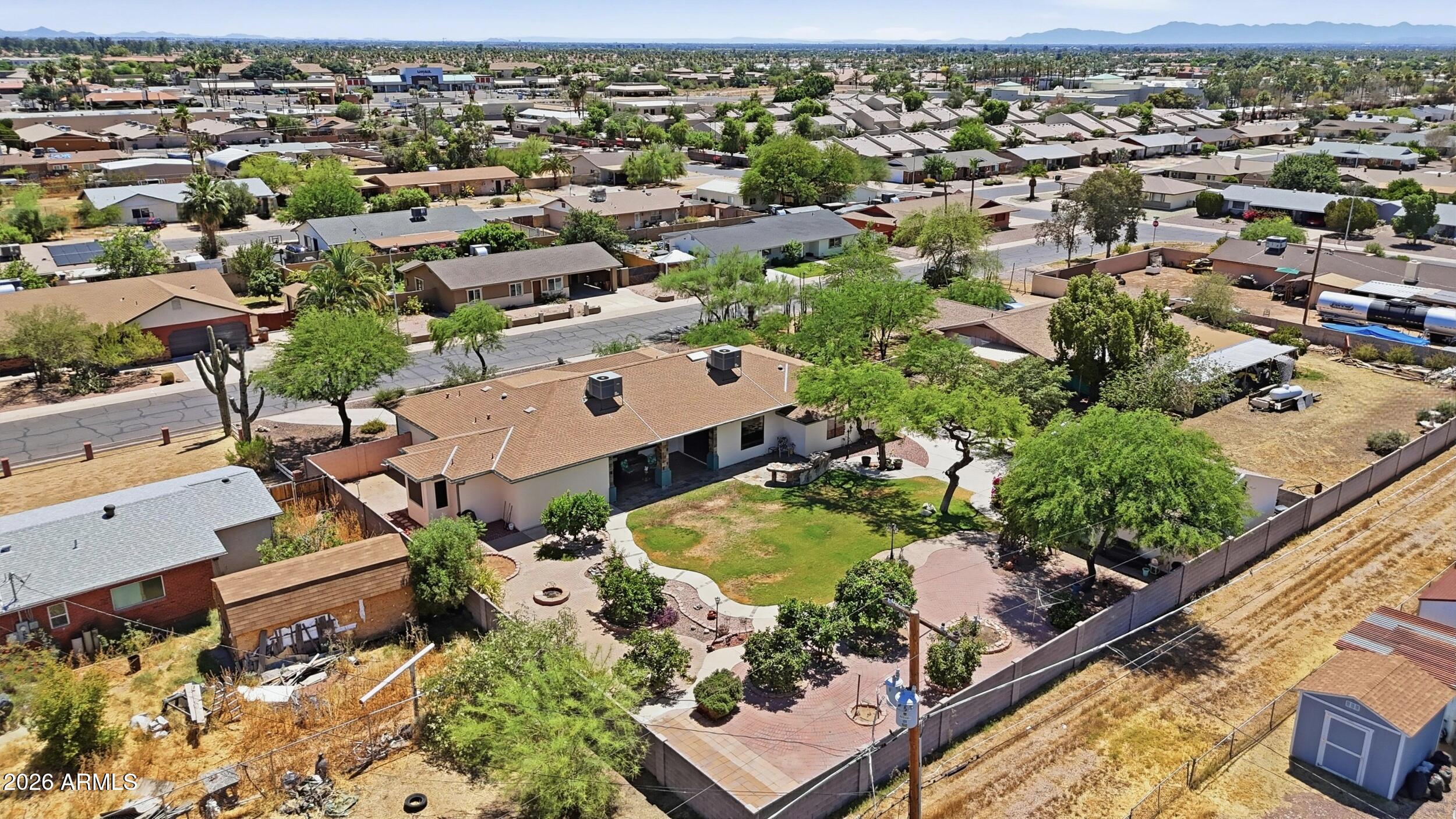 6334 East Albany Street Mesa, AZ 85205 - Photo 64 of 72 an aerial view of residential houses with outdoor space