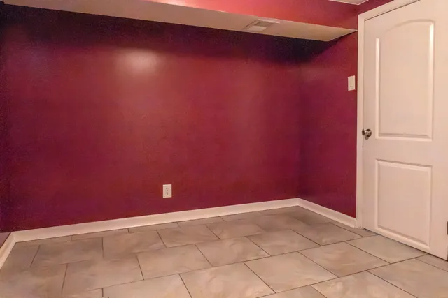 a view of a room with an empty space