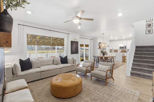 596 South Meade Street Mapleton, UT 84664 - Photo 5 of 38 Living room featuring light wood-style flooring, recessed lighting, ceiling fan, and healthy amount of natural light
