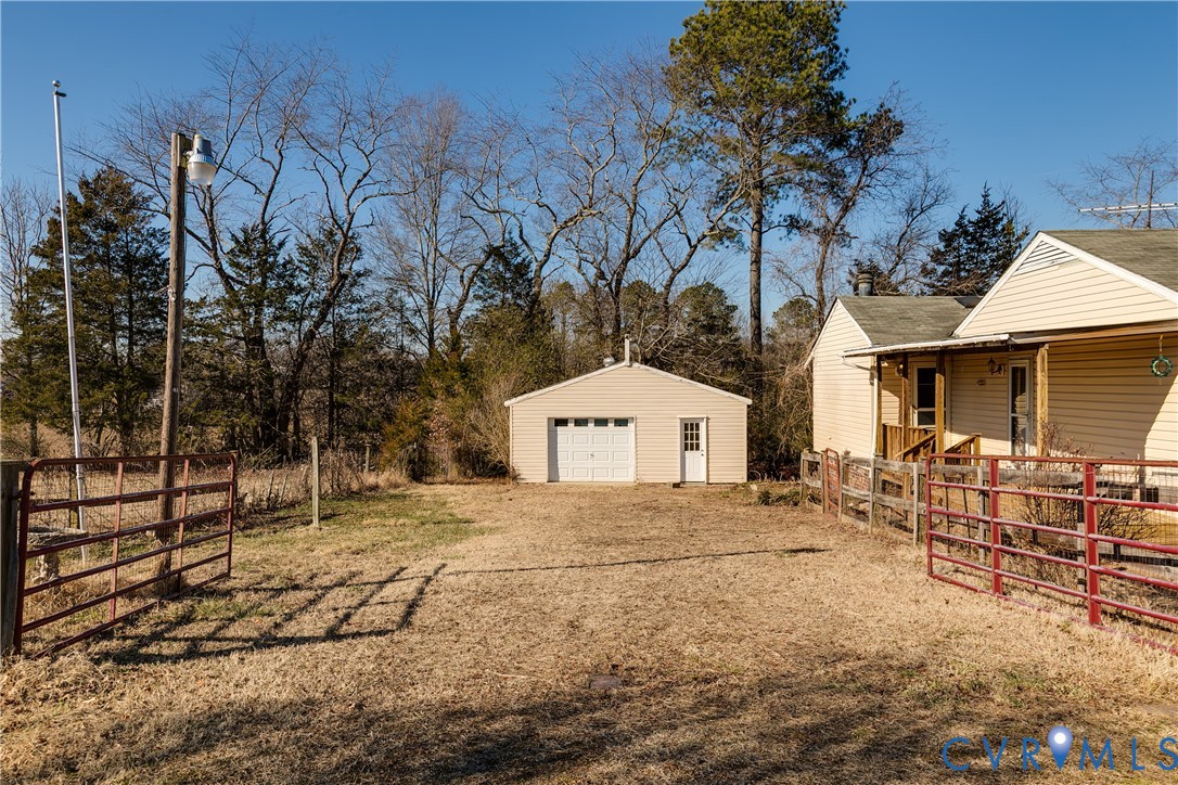 15105 Brown Pleasants Road Montpelier, VA 23192 - Photo 3 of 37 a house with trees in the background