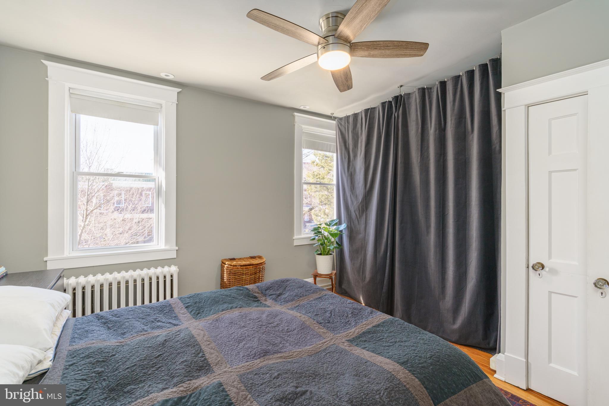 3749 Beech Avenue Baltimore, MD 21211 - Photo 16 of 34 a bedroom with a bed and a window