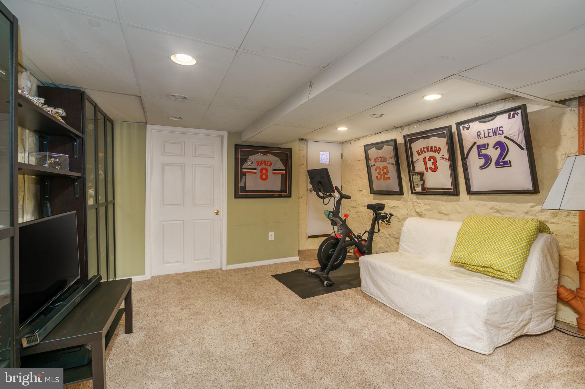 3749 Beech Avenue Baltimore, MD 21211 - Photo 23 of 34 a view of a room with gym equipment