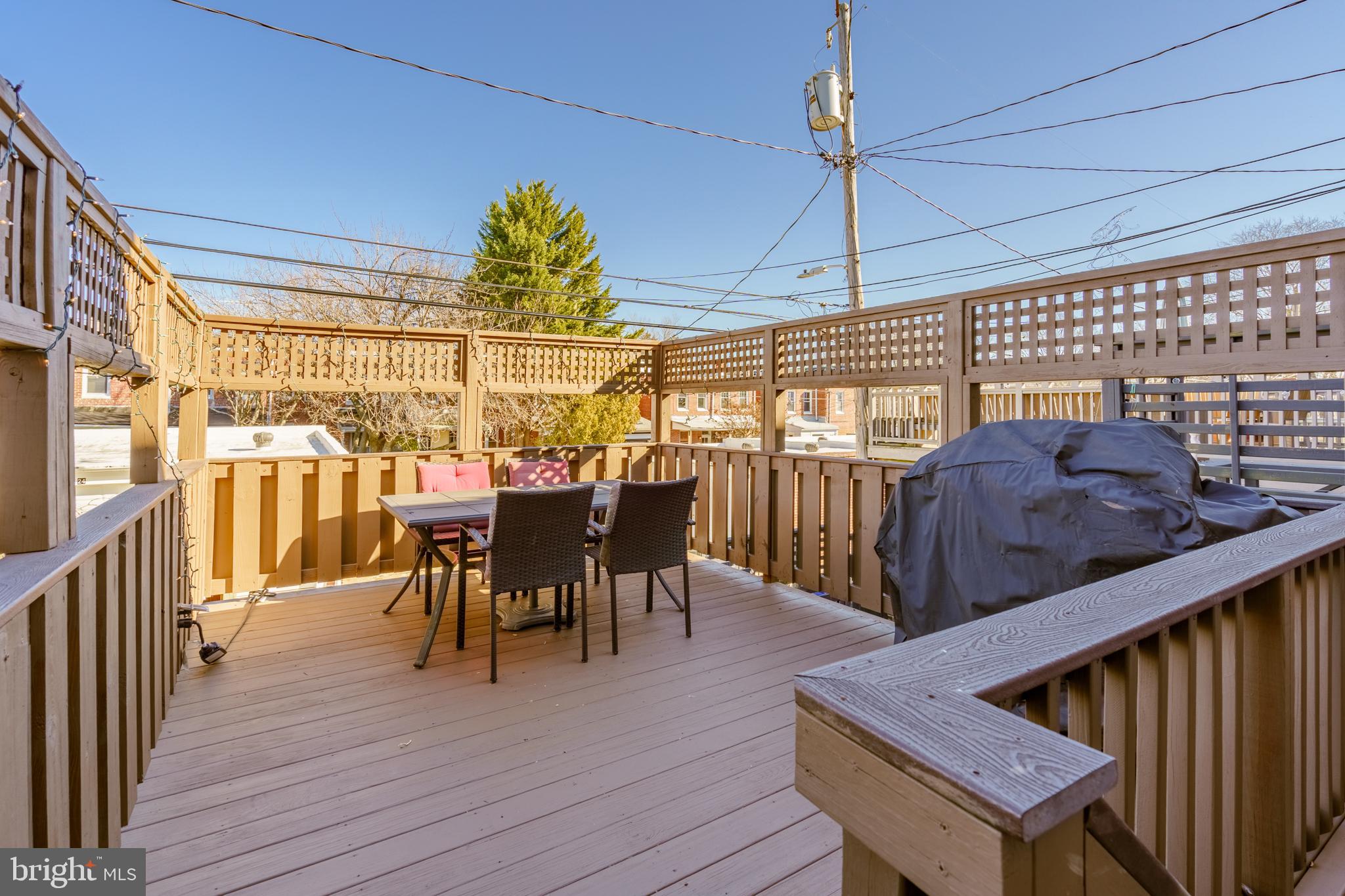 3749 Beech Avenue Baltimore, MD 21211 - Photo 26 of 34 a view of a dining room with furniture window and wooden floor