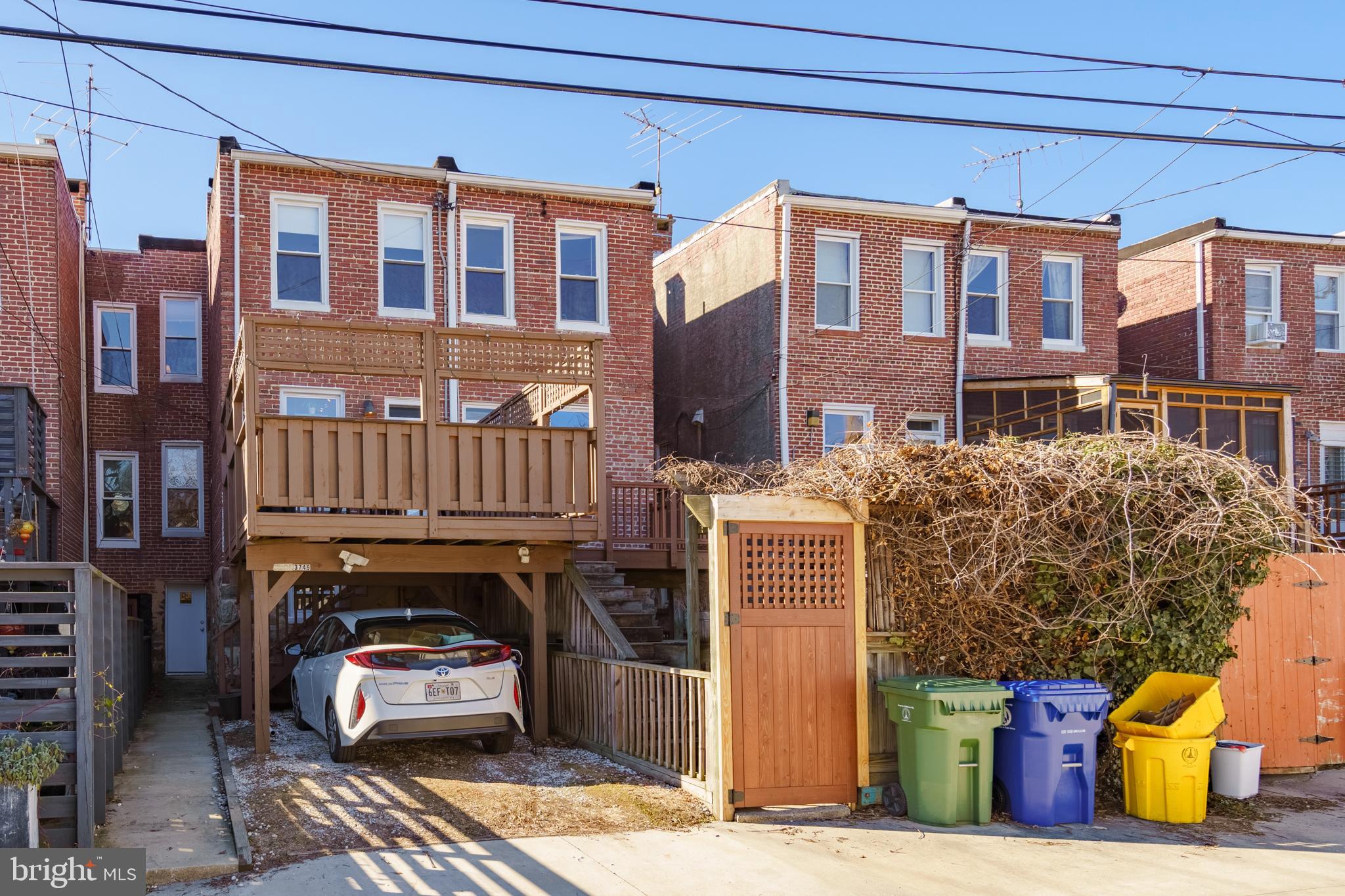 3749 Beech Avenue Baltimore, MD 21211 - Photo 27 of 34 a front view of a building with many windows