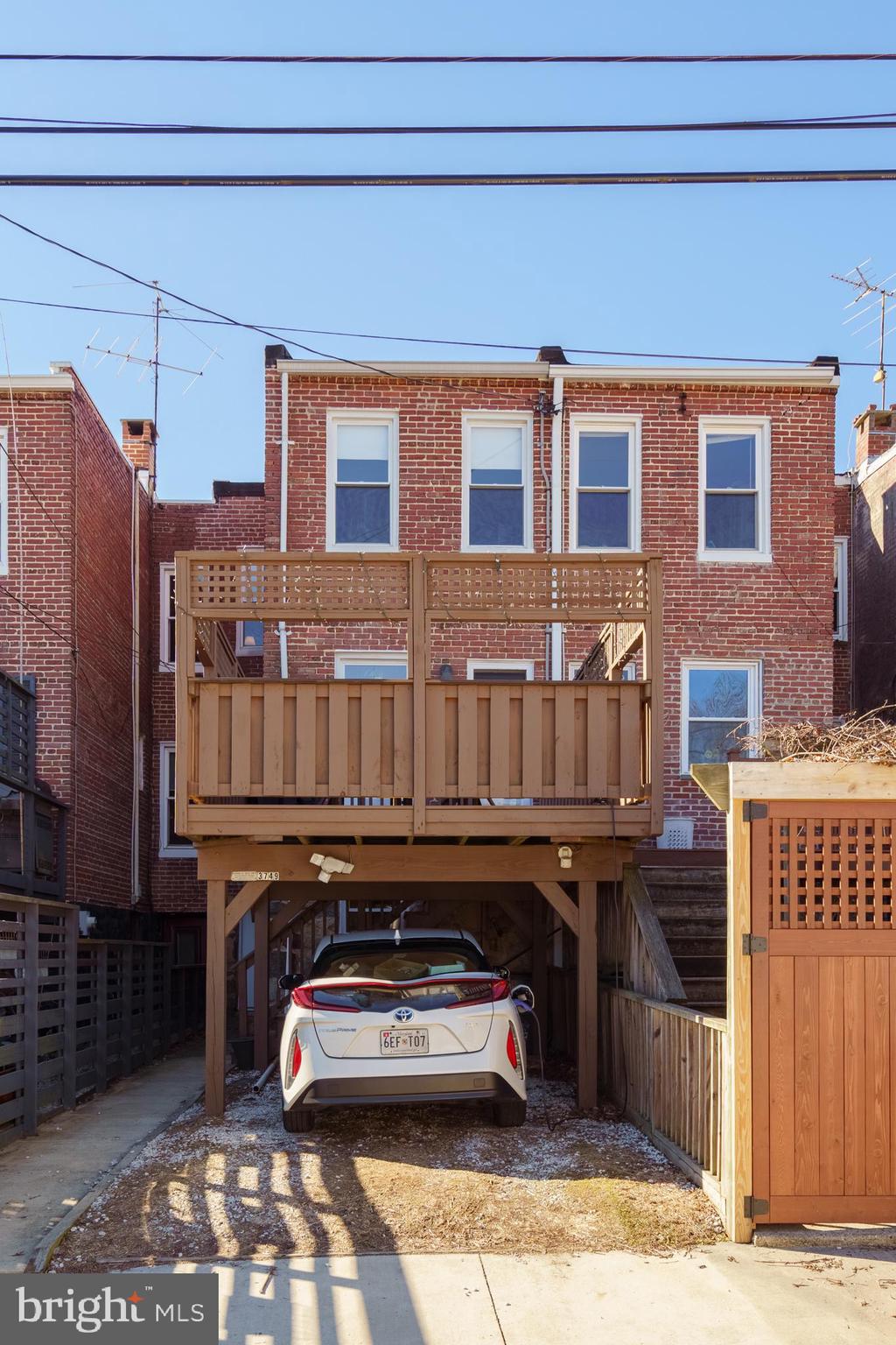 3749 Beech Avenue Baltimore, MD 21211 - Photo 28 of 34 a car parked in front of a building