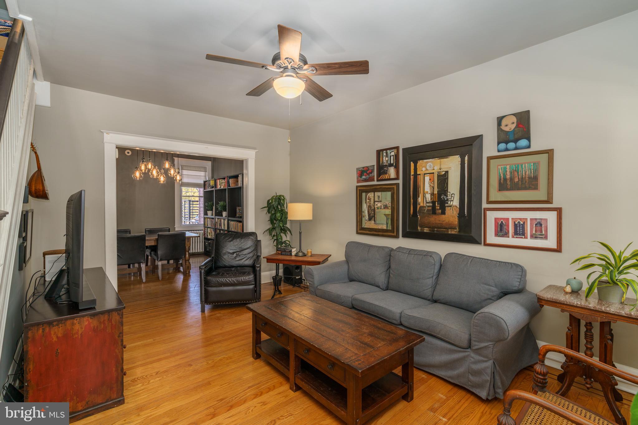 3749 Beech Avenue Baltimore, MD 21211 - Photo 4 of 34 a living room with furniture and wooden floor