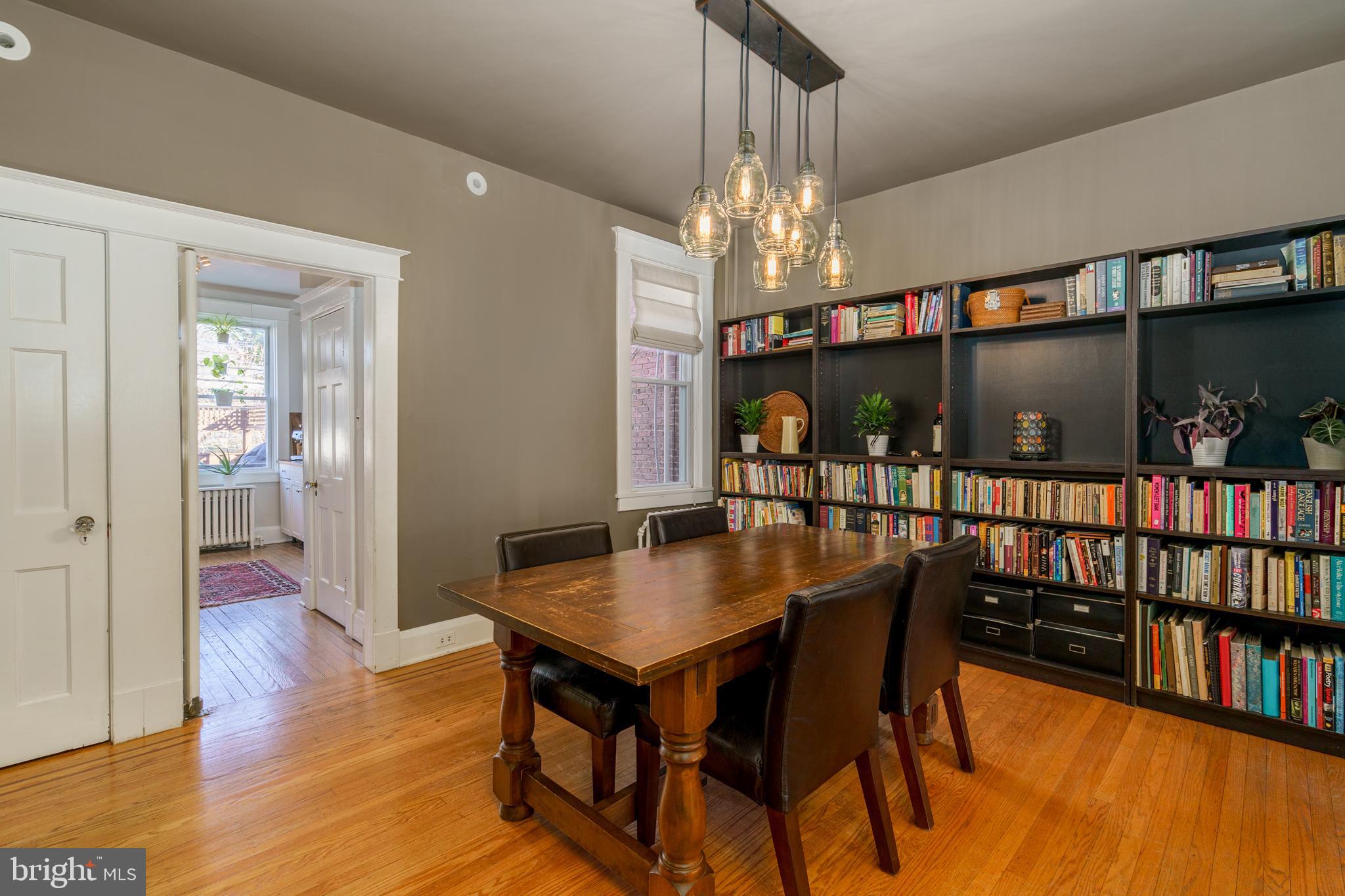 3749 Beech Avenue Baltimore, MD 21211 - Photo 7 of 34 a view of a dining room with furniture and chandelier
