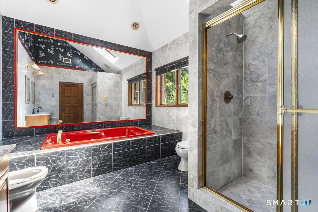 49 Partridge Lane Middletown, CT 06457 - Photo 20 of 39 a bathroom with a tub and shower