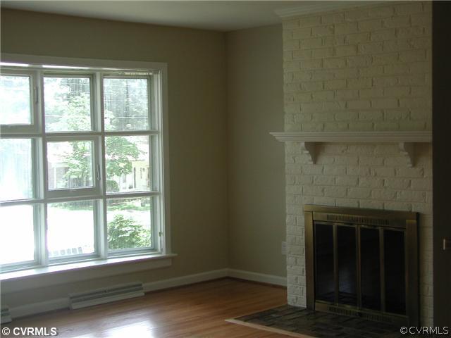 2706 Dancer Road Richmond, VA 23294 - Photo 4 of 11 Living Room - Living Room fireplace. Wood burning.