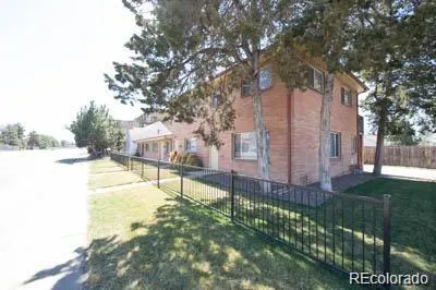 a view of a swimming pool with a garden