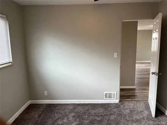 a bathroom with a tub sink and vanity