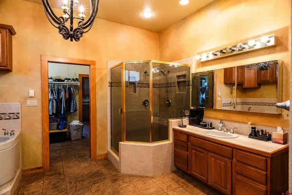a bathroom with a bathtub and a sink