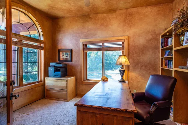 a room with furniture and a window