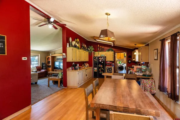 a view of a living room and dining room