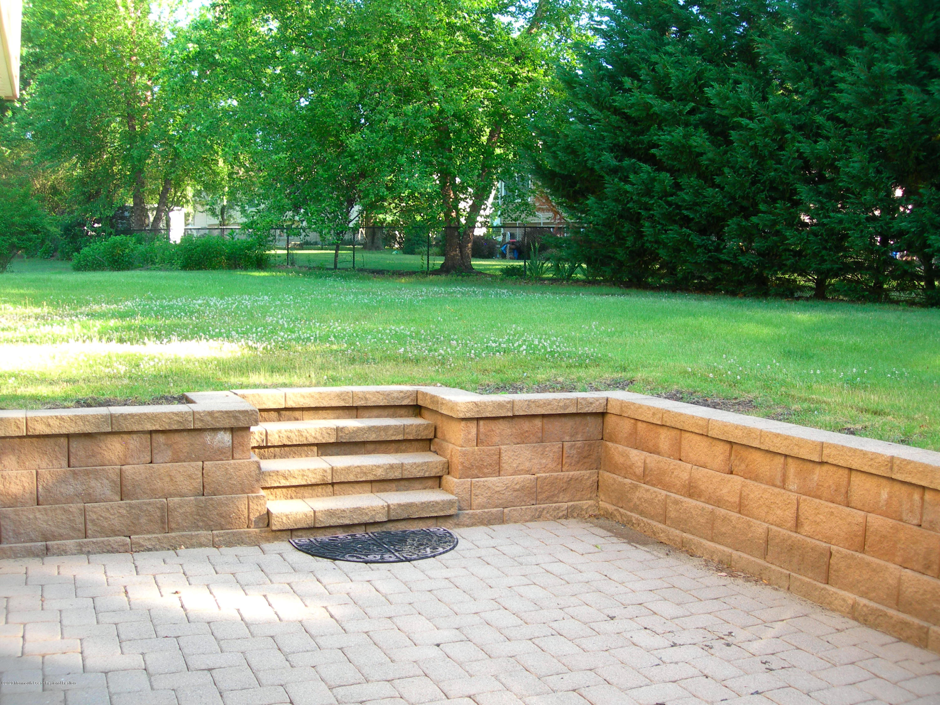 34 Shelbern Drive Lincroft, NJ 07738 - Photo 14 of 25 a view of backyard with green space