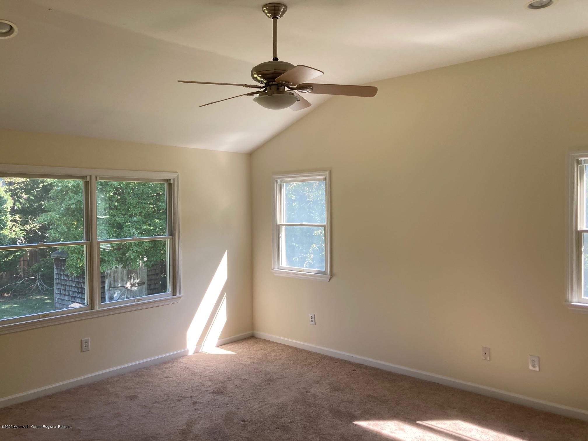 34 Shelbern Drive Lincroft, NJ 07738 - Photo 9 of 25 a view of room with window and ceiling fan