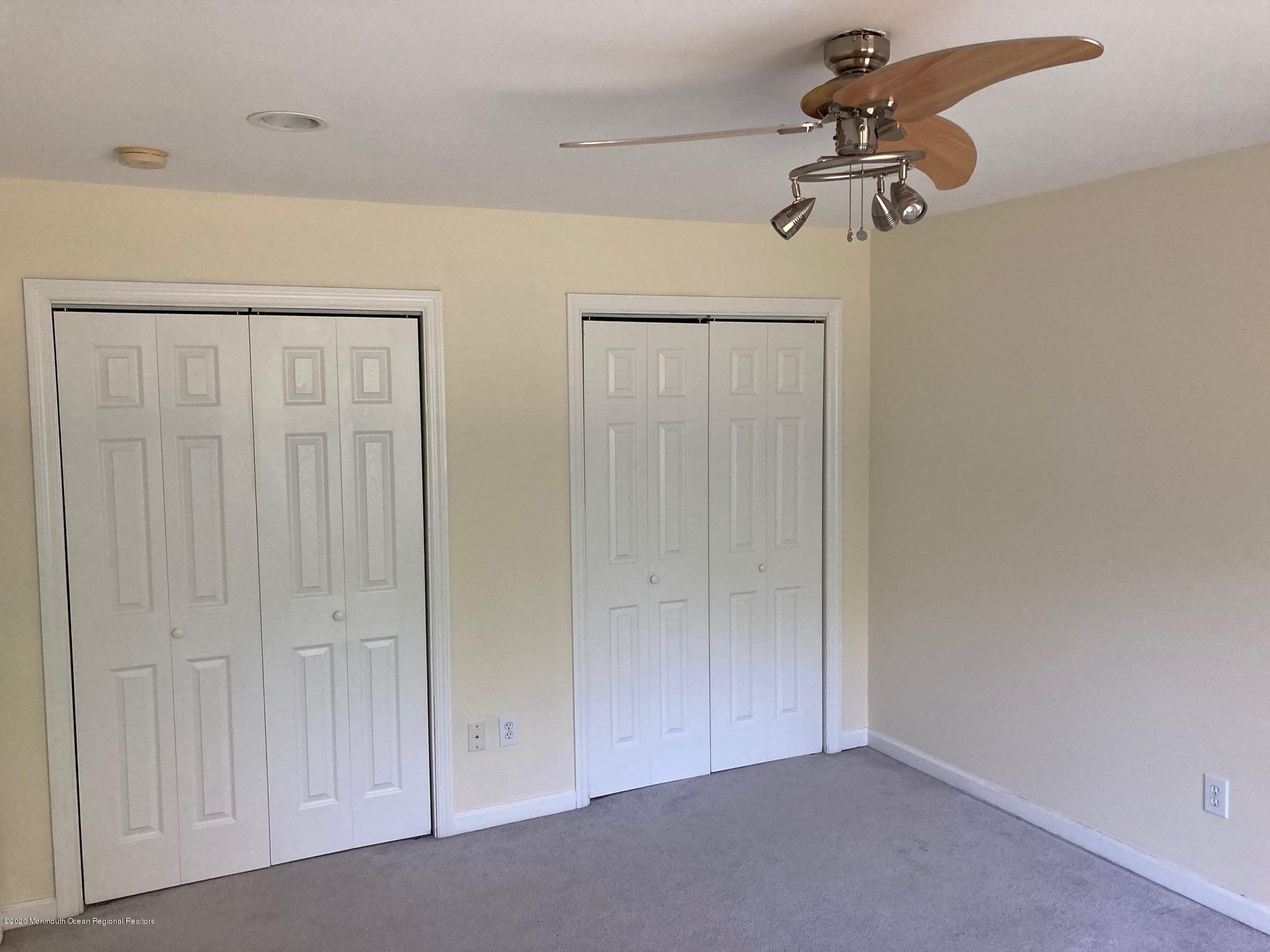 34 Shelbern Drive Lincroft, NJ 07738 - Photo 10 of 25 a view of room with a ceiling fan