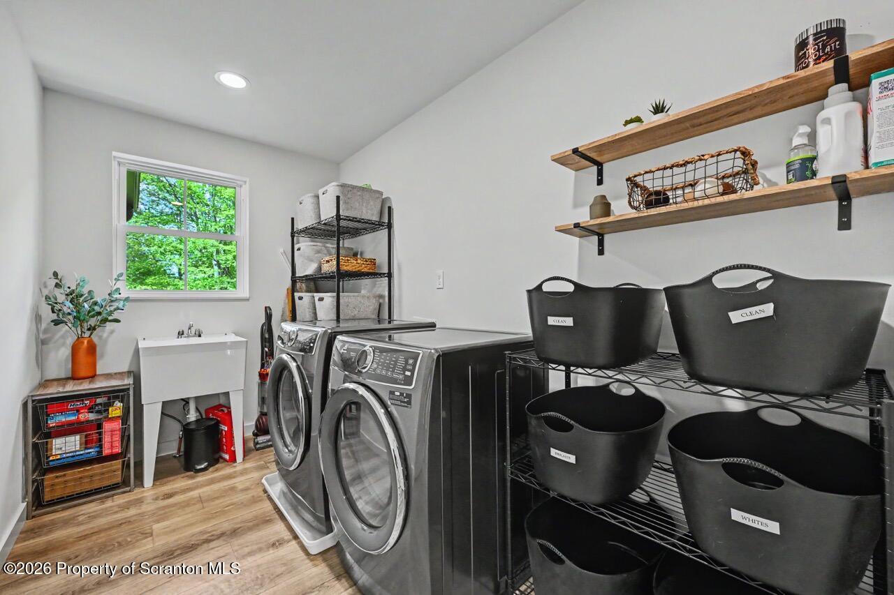 100 Highland Road Moscow, PA 18444 - Photo 56 of 85 a view of storage and utility room with washer and dryer