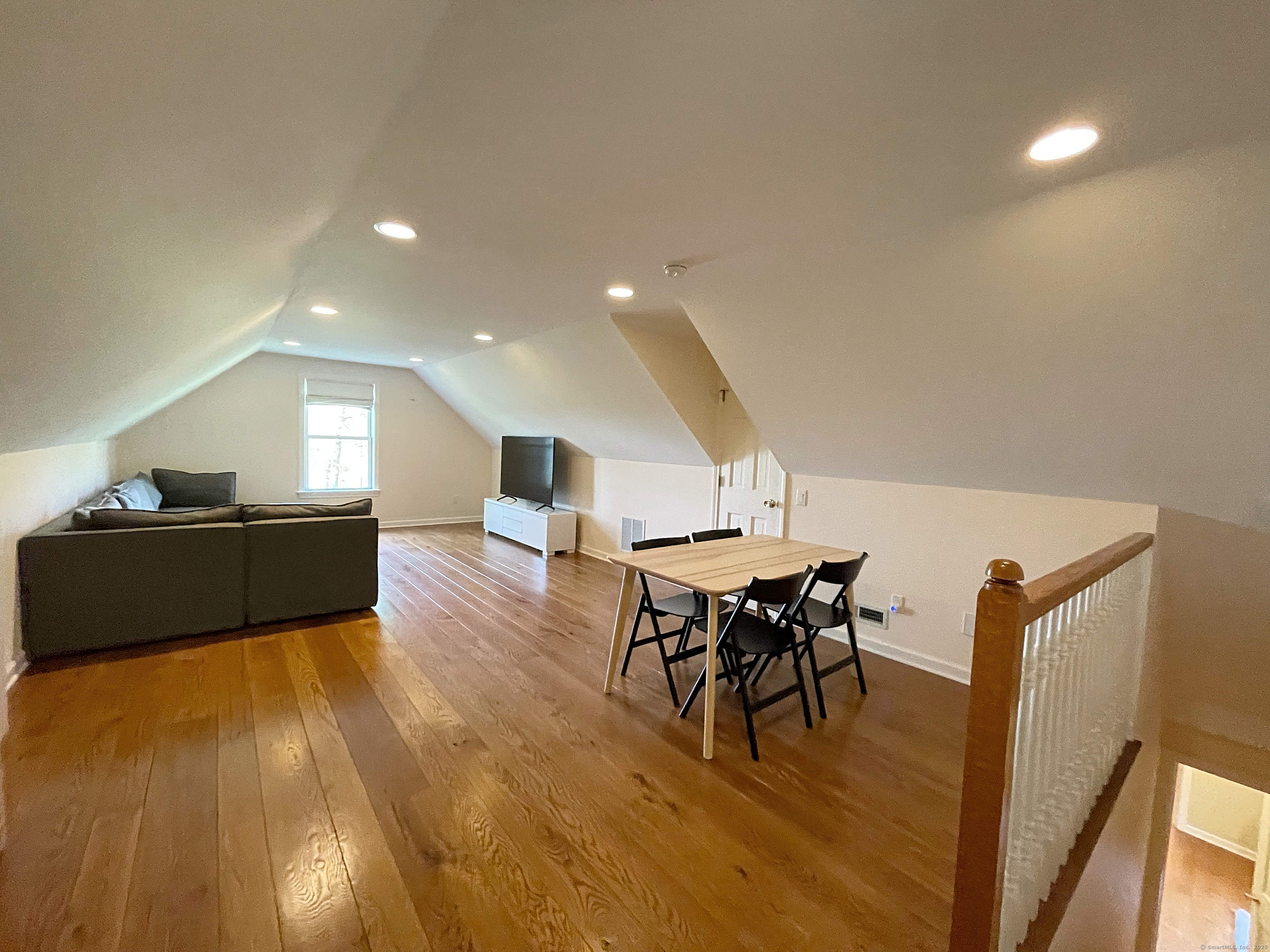 170 Rabbit Hill Road Warren, CT 06777 - Photo 15 of 28 a view of a dining room with furniture and wooden floor