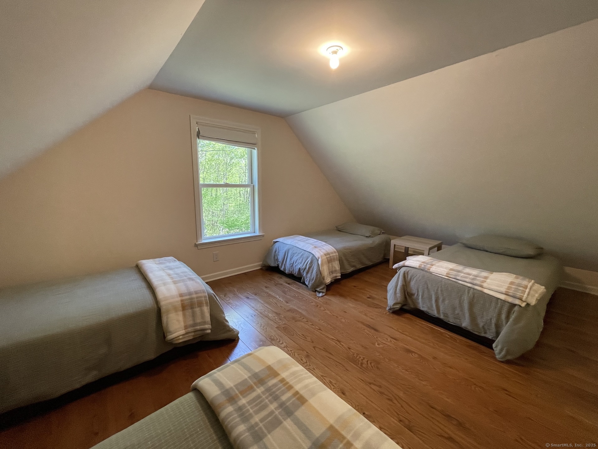 170 Rabbit Hill Road Warren, CT 06777 - Photo 16 of 28 a bedroom with two beds and a window