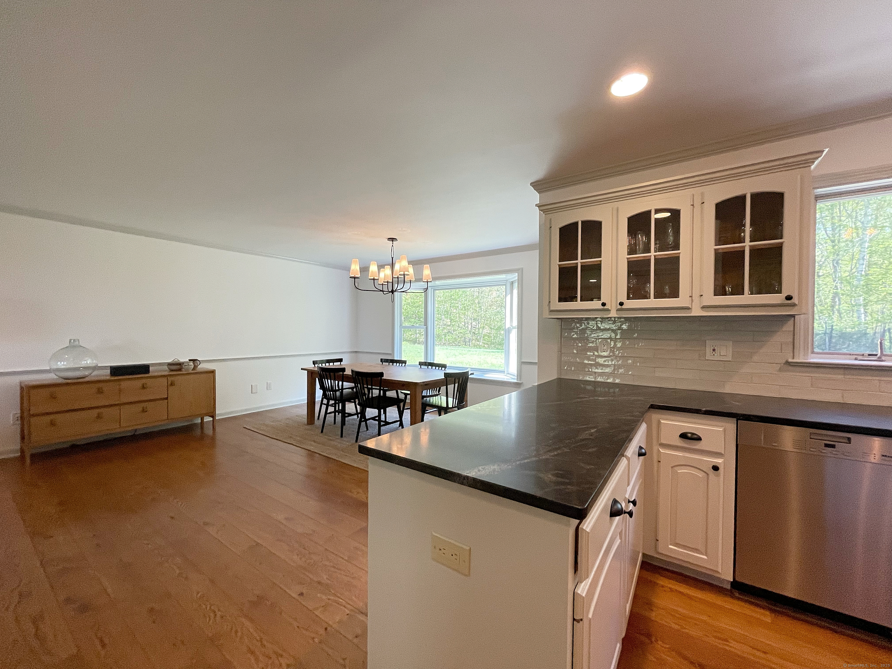 170 Rabbit Hill Road Warren, CT 06777 - Photo 17 of 28 a kitchen with granite countertop a stove and a sink