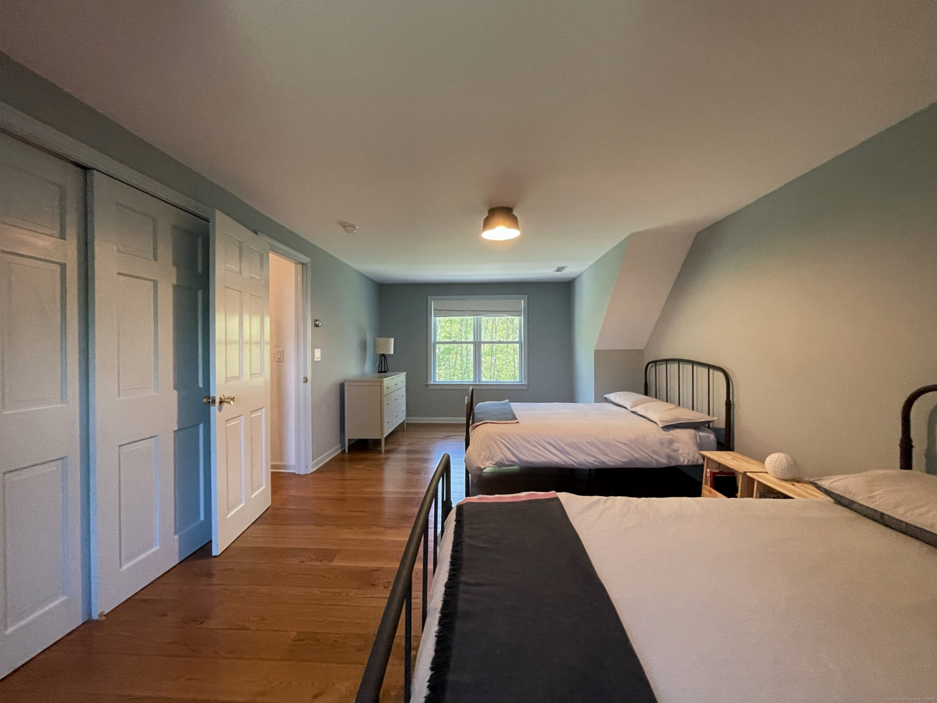 170 Rabbit Hill Road Warren, CT 06777 - Photo 22 of 28 a bedroom with a bed and window