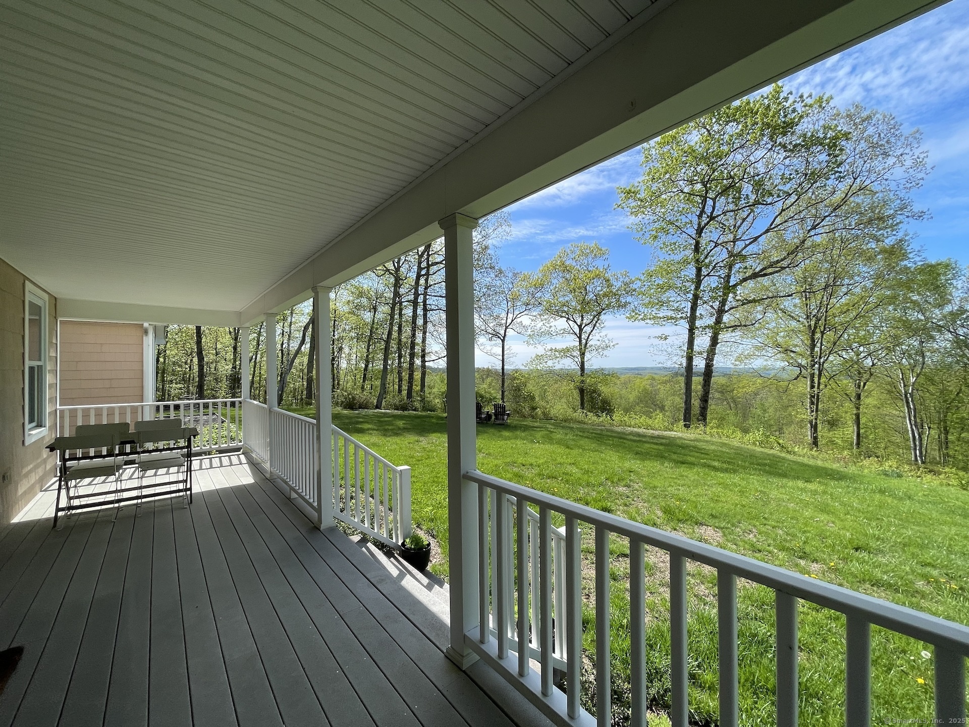 170 Rabbit Hill Road Warren, CT 06777 - Photo 28 of 28 a view of a porch with wooden floor and outdoor space