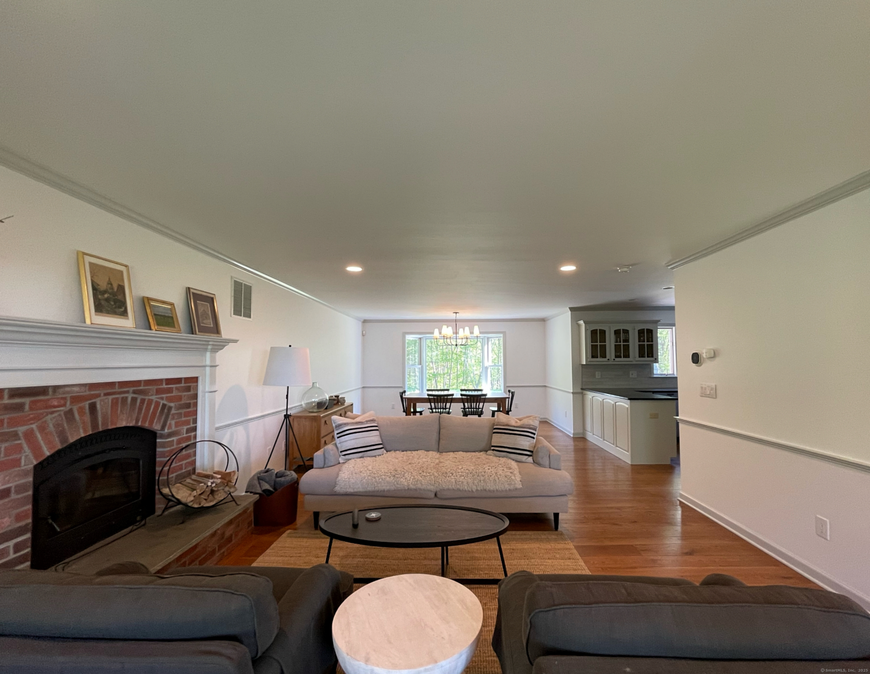 170 Rabbit Hill Road Warren, CT 06777 - Photo 6 of 28 a living room with furniture and a fireplace