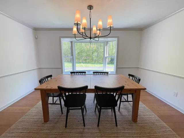 a kitchen with granite countertop a stove and a sink
