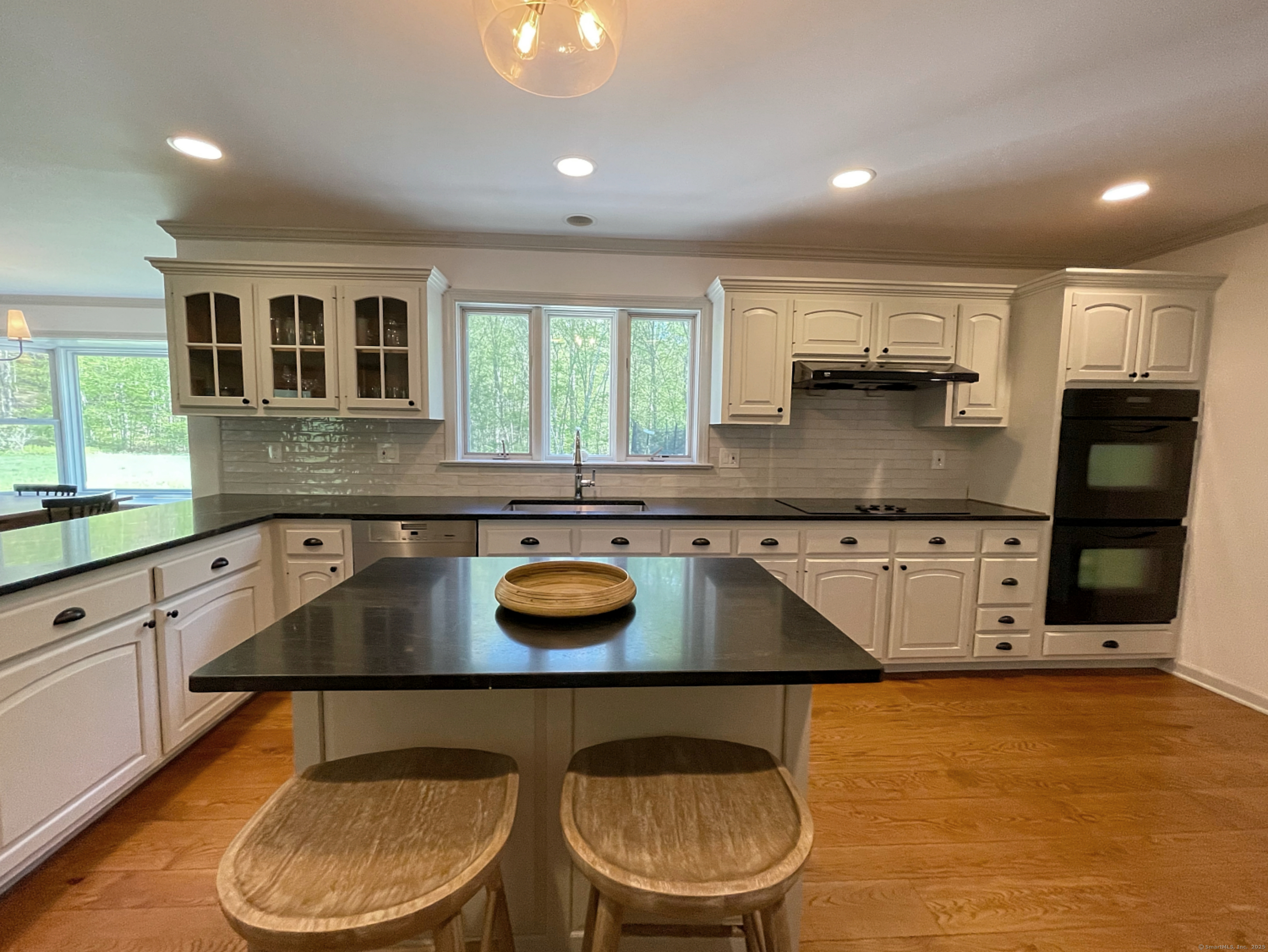 170 Rabbit Hill Road Warren, CT 06777 - Photo 10 of 28 a kitchen with a stove a sink and a stove