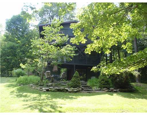 334 Village Run Road Boswell, PA 15531 - Photo 5 of 10 Exterior Back. This is such a peaceful setting, you can t help but relax and enjoy the pond, and flagstone patio!
