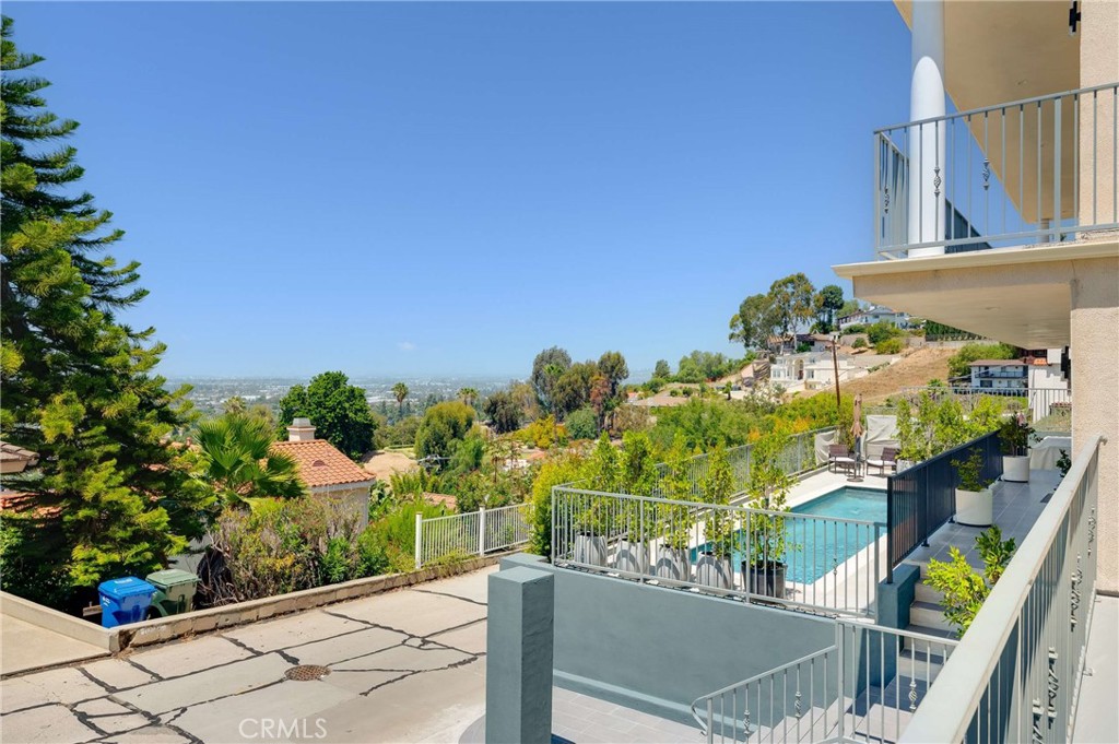 11837 Rideout Way Whittier, CA 90601 - Photo 4 of 44 a view of a balcony with wooden floor