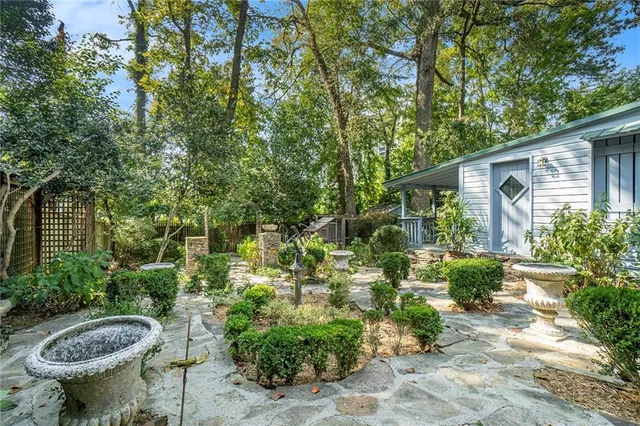 a view of a backyard with garden