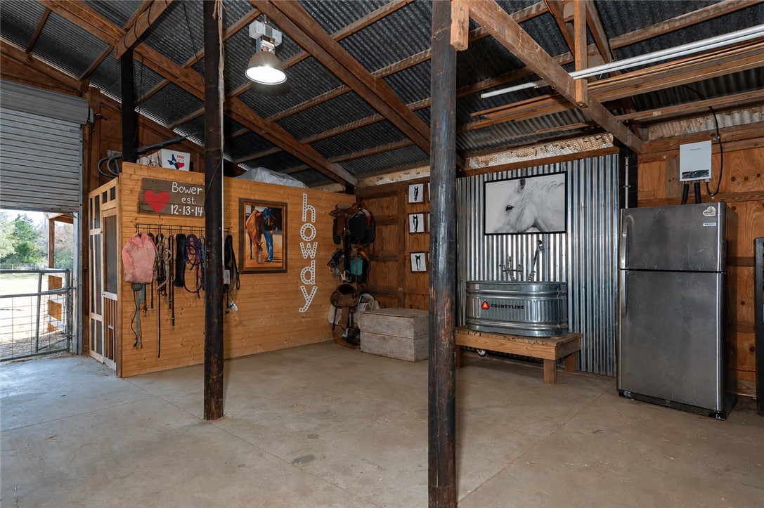 2302 Quail Run College Station, TX 77845 - Photo 31 of 49 Tack wall with hay room / tack room
