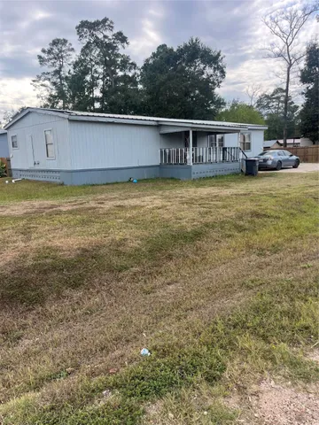 a view of a house with swimming pool