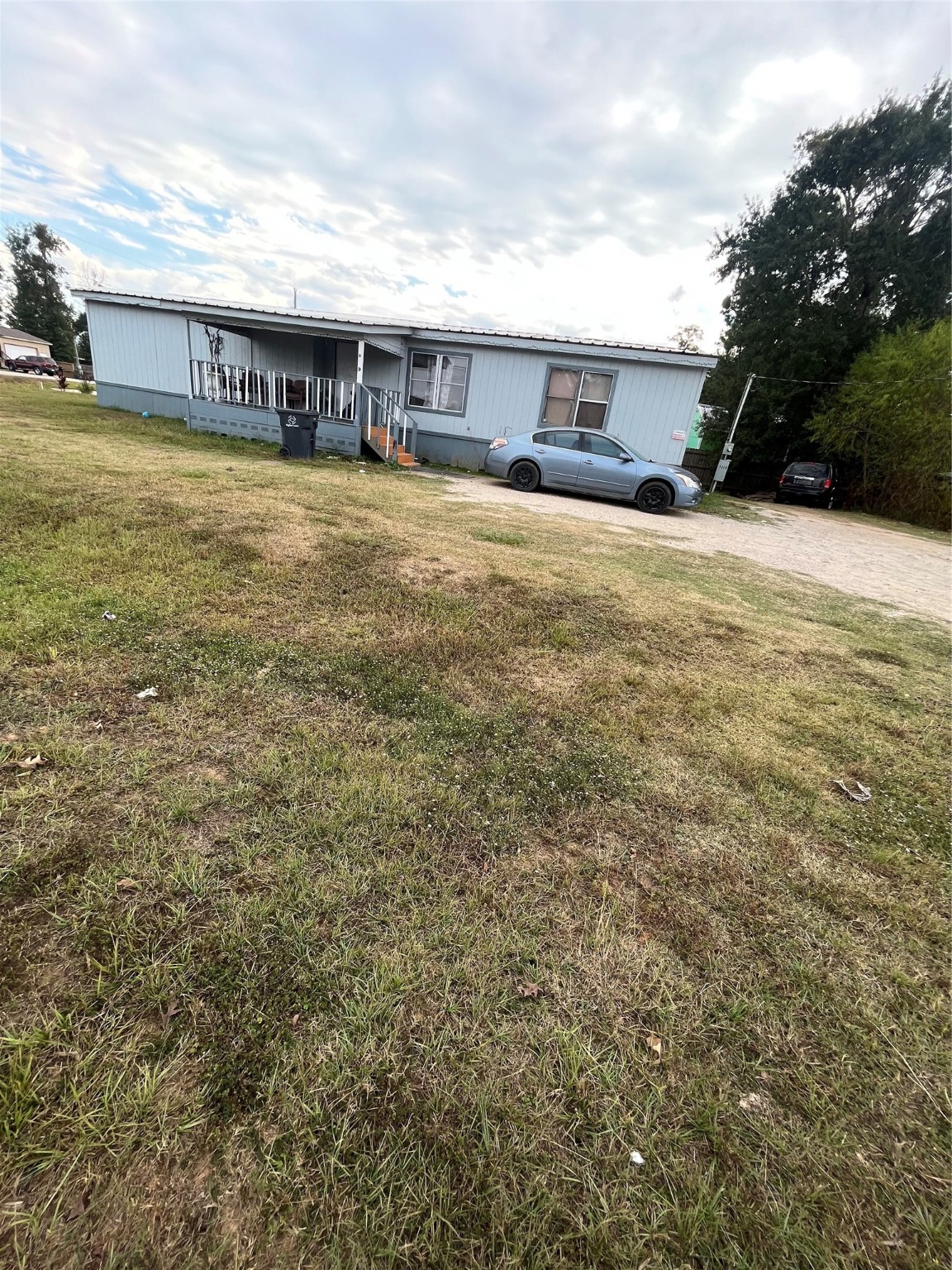 8009 Forest Trace Conroe, TX 77306 - Photo 7 of 16 a view of swimming pool with an outdoor space and seating area