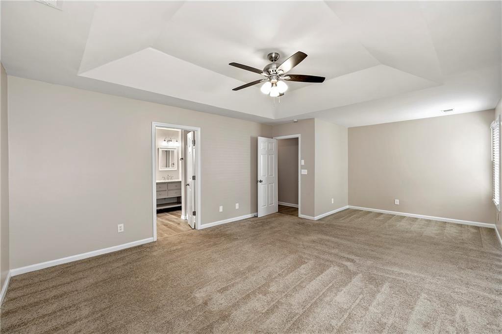 6020 Aderhold Way Alpharetta, GA 30004 - Photo 5 of 16 a view of an empty room with chandelier fan