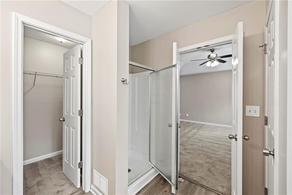 6020 Aderhold Way Alpharetta, GA 30004 - Photo 6 of 16 a bathroom with a shower