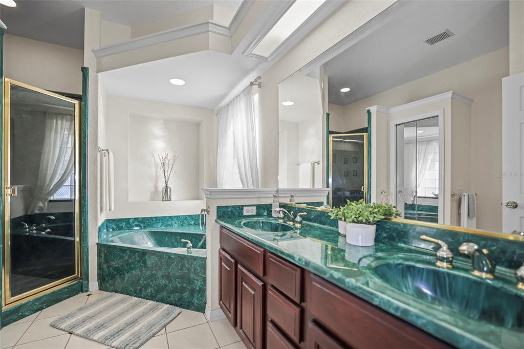 4503 North Rye Road Parrish, FL 34219 - Photo 28 of 68 a bathroom with sink and mirror